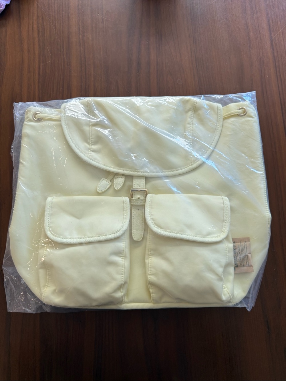 Year of Ours Cream Drawstring Backpack with Double Front Pockets
